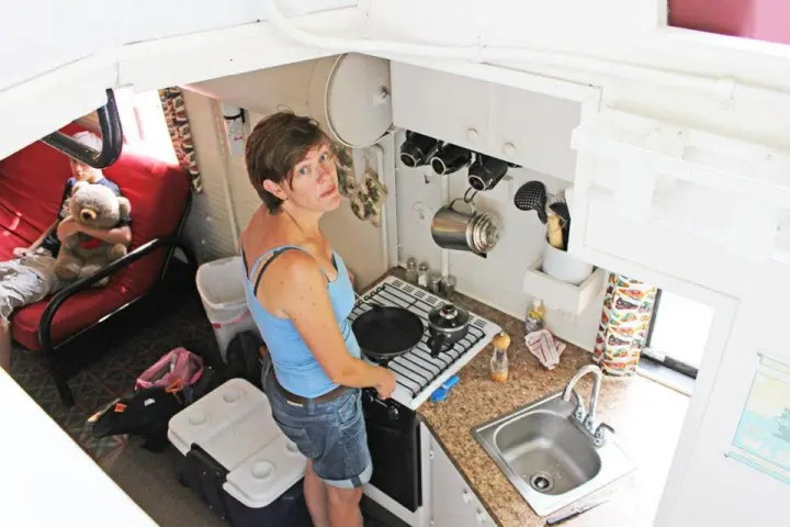 a person standing in front of a computer