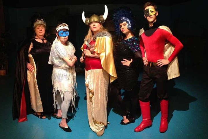 a group of people posing for the camera