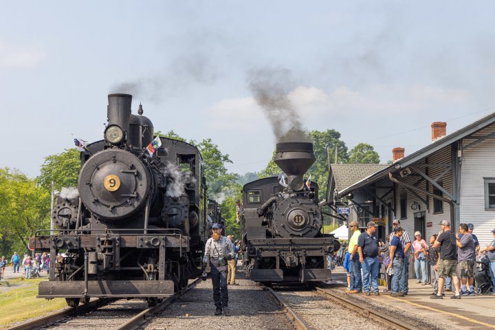 a steam train on a steel track
